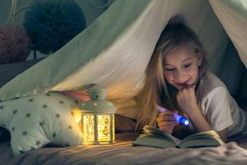 Girl enjoying a book © Photographee.eu