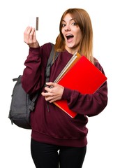 Student woman holding a credit card