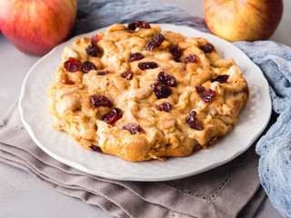 Apple pie with dried cranberries. Autumn baking with apples