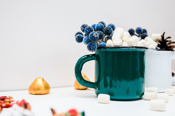 marshmallow in an iron mug 