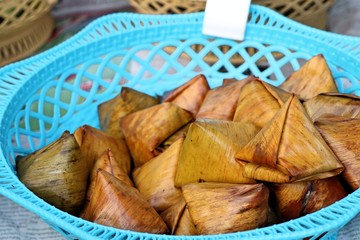 dough wrapped in banana leaves