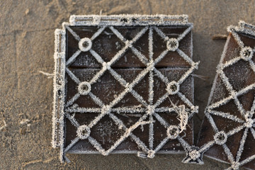 Frozen construction material in the sand