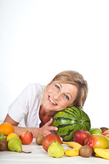 Fruits and blond cute woman