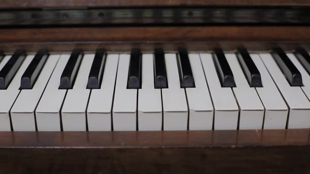 Piano Keys close up keyboard tracking shot 