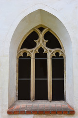 Fototapeta na wymiar High gothic empty window in abandoned church