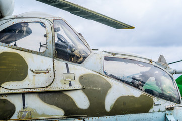 Part of the fuselage as a background of a combat helicopter Mi 24