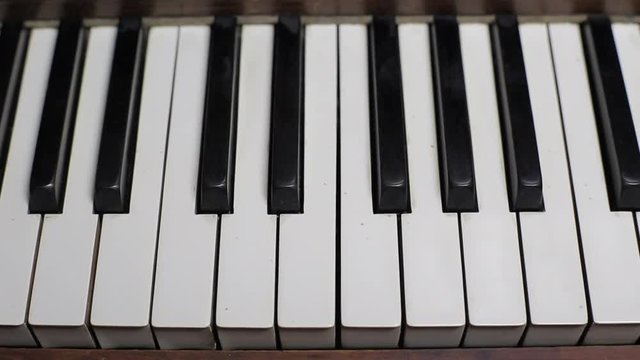 Piano Keys close up keyboard tracking shot