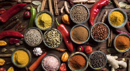 Spices, herbs on a wooden table