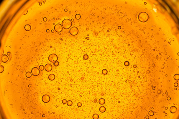 Close Up Macro Shot Of Honey Bubbles