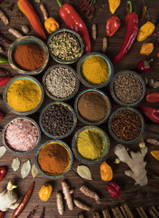 Spices, herbs on a wooden table