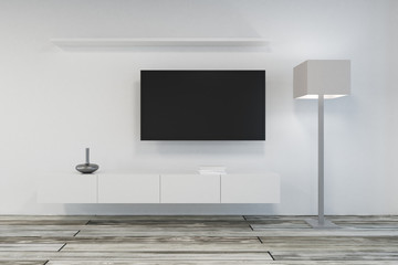 Contemporary living room with empty TV
