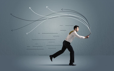 Running businessman with device and hand drawn lines