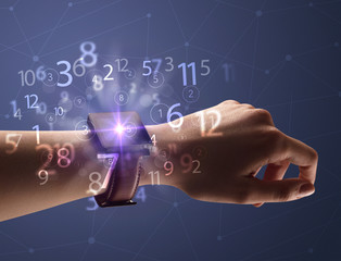 Close up hand with smartwatch and numbers