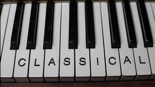CLASSICAL written in black on white piano keys