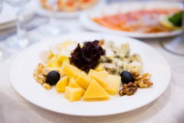 Cheese plate on the table in restaurant