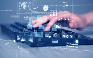 Keyboard buttons pressed by hand with high tech icons