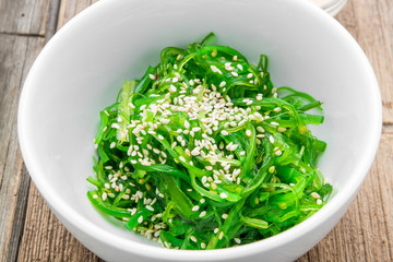 Chuka salad and pickled ginger close-up on the table.