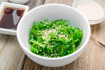 Chuka salad and pickled ginger close-up on the table.