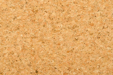 Cork sheet surface with coarse texture, comprised of rough grained cork oak, Quercus suber. Decorative panels and veneers, used as bulletin boards, floor and wall tiles. Top view. Photo.