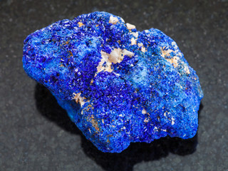 raw crystalline Azurite stone on dark background