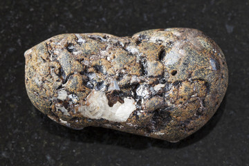 pebble of sphalerite stone with Galena on dark