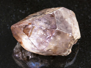 amethyst rough crystal on dark background