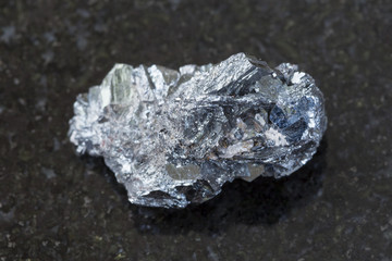 rough hematite ore on dark background