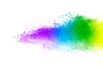 Splash of colorful powder over white background.