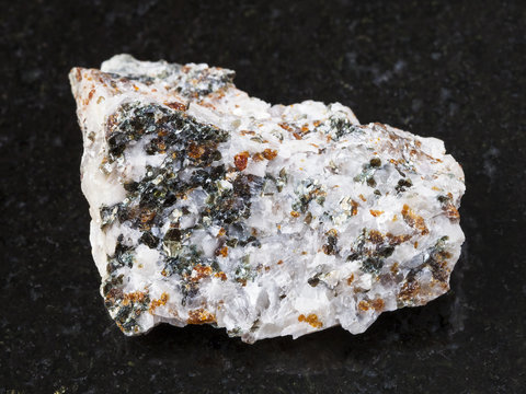 chondrodite and diopside in raw calcite stone