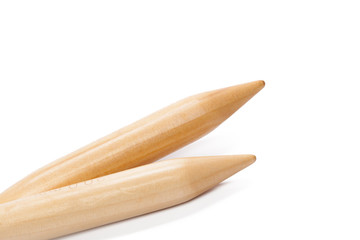 Wooden knitting needles isolated on white