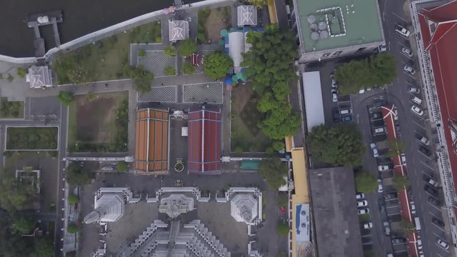 Aerial view of Wat Phra That Hariphunchai pagoda temple important religious traveling destination in Lamphun province northern of Thailand. icture high resolution on helicopter