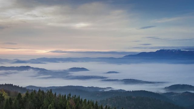 Flowing clouds in the Tatra mountains at sunrise, Poland, Timelapse