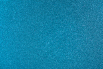 blue glitter texture paper background.  shiny paper bright and light