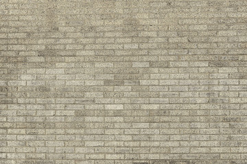 Old grey brick wall background texture