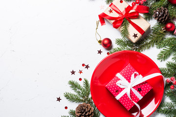 Christmas table setting on white background.