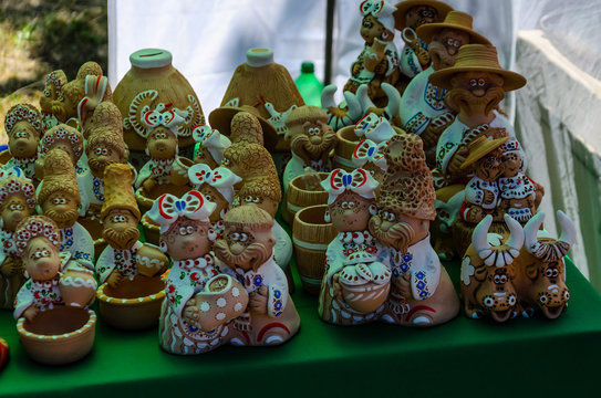 Different Ukrainian figurines for sale on fair