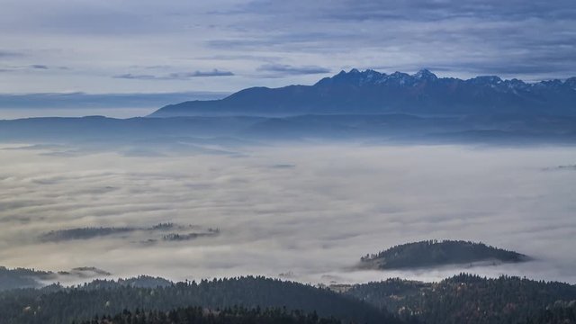 Stunning sunrise with flowing clouds in the Tatra mountains , Poland, Timelapse