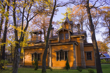 Fototapeta premium The Orthodox Church of St. Panteleimon is located on the territory of a hospital in St. Petersburg in Russia, a wooden Russian church in the fall