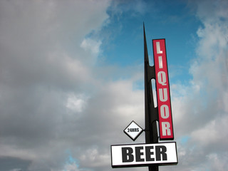 liquor and beer sign with clouds