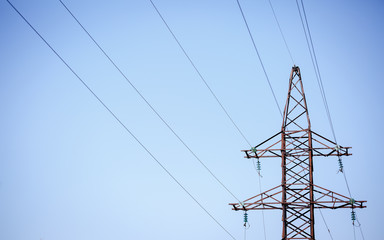 Electrical wires against the sky