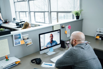 Businessmen on video conference