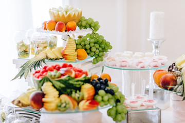 many different fruits an the wedding reception.