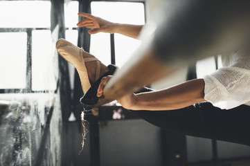Ballet dancer women do flexibility exercises