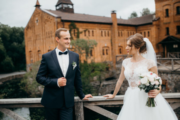 Bride and groom in the castle on the wedding 