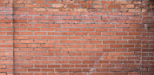 old horizontal wide empty brick wall