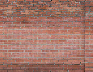 old horizontal wide empty brick wall