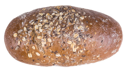 Big whole grain brown bread with crust. Freshly baked loaf with oat flakes and linseed. Isolated on white background.