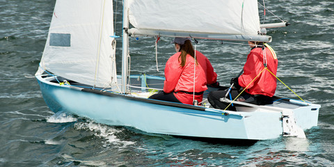 Children lake sailing.