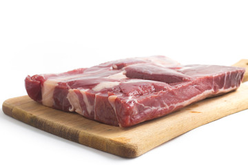 Jerked Beef. Brazilian Carne seca on a wooden board