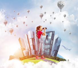 Concept of careless happy childhood with girl looking in future